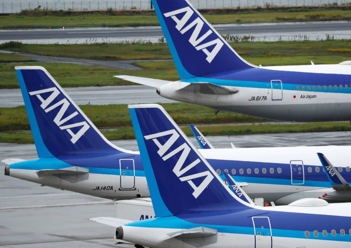 FILE PHOTO: All Nippon Airways (ANA) aircrafts at the Tokyo International Airport, commonly known as Haneda Airport in Tokyo, Japan October   23, 2020. REUTERS/Issei Kato/File Photo